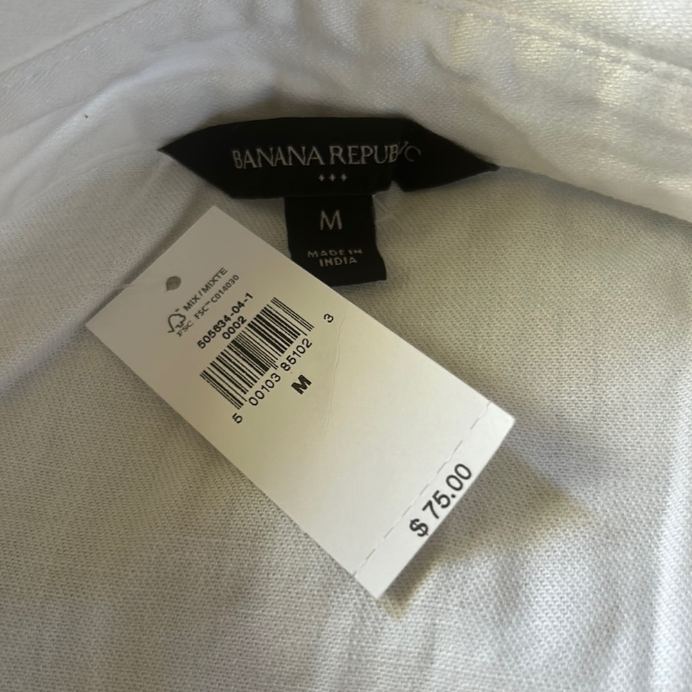 White button down top, long sleeve- brand new with tags.
